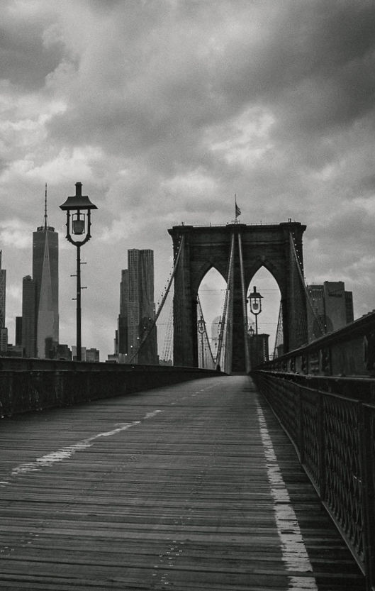 Brooklyn Bridge walkway and skyline, New York.