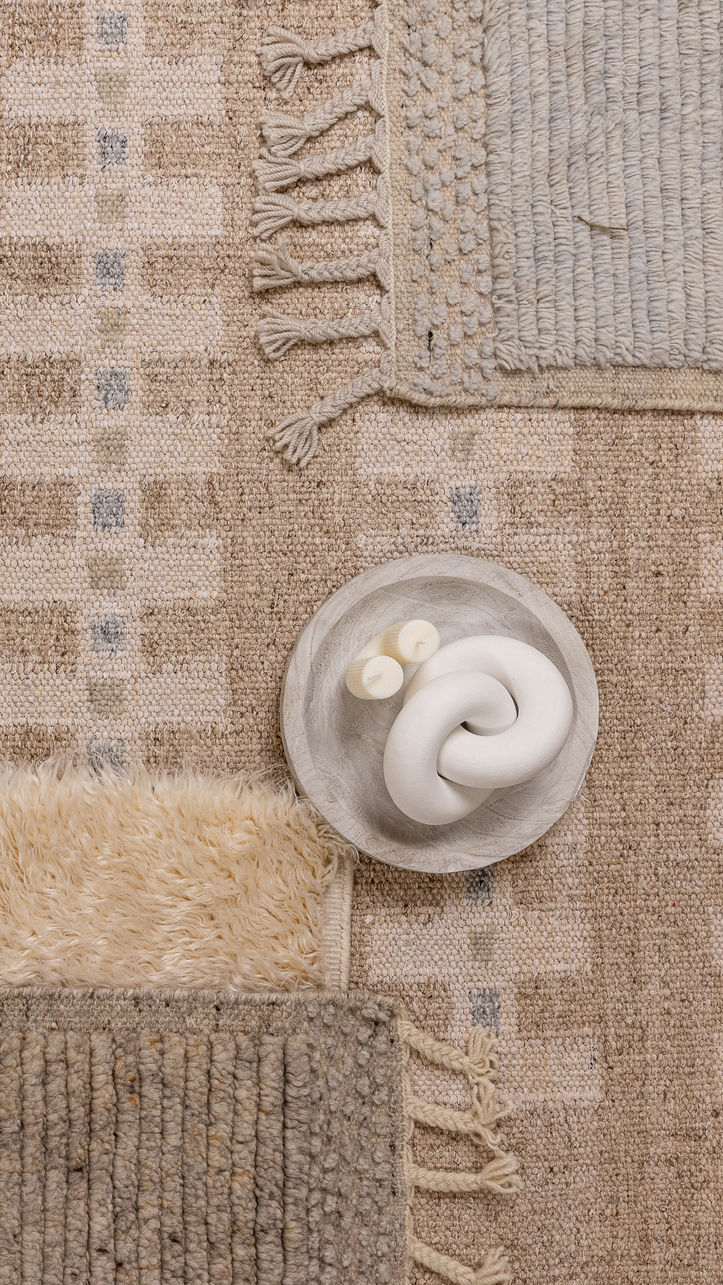 bohemian rug flatlay in minimalist interior