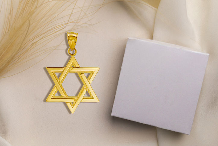 Stacked gold rings captured by Commapix for commercial use