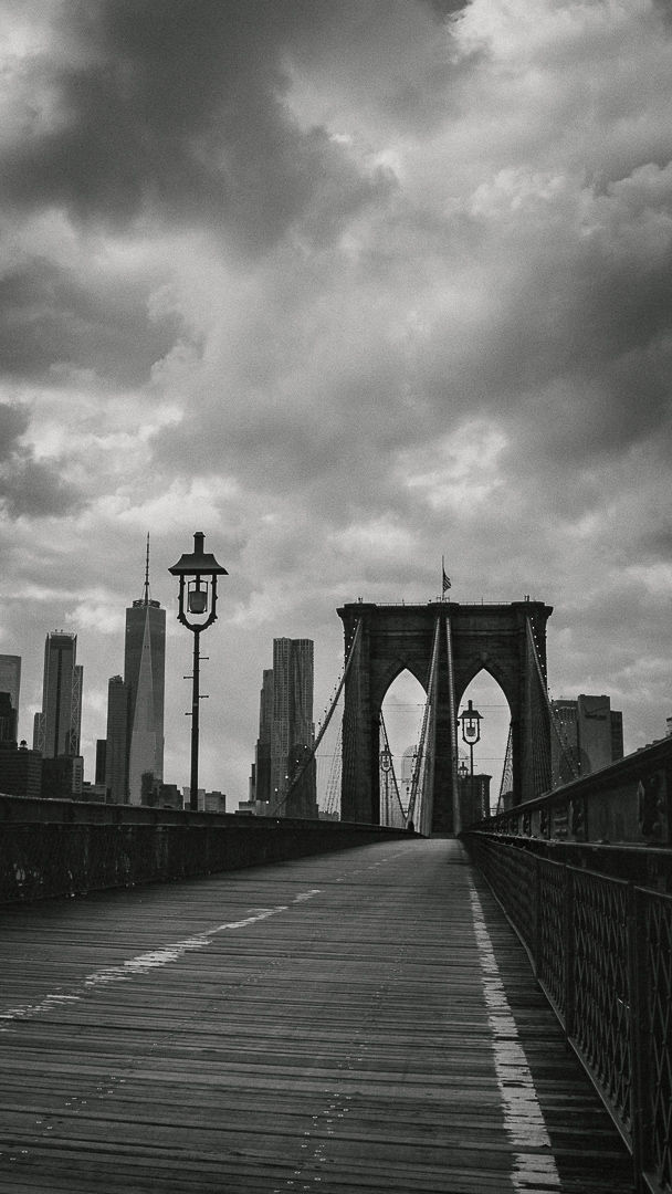 Brooklyn Bridge walkway and skyline at dawn, New York