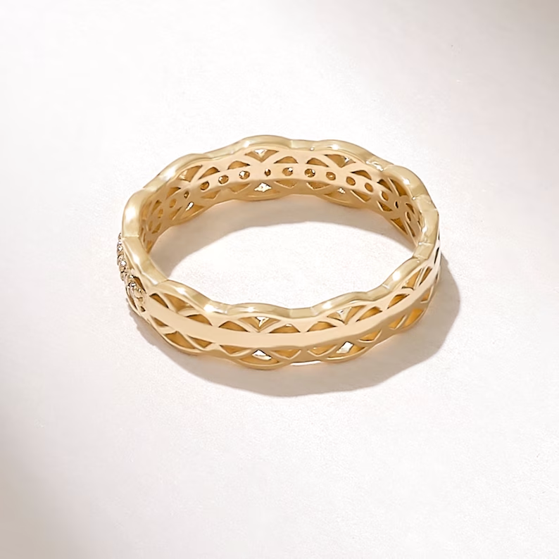 Thumbnail: Yellow Gold Celtic Knot Wedding Ring: Unique Trinity Knot Eternity Band