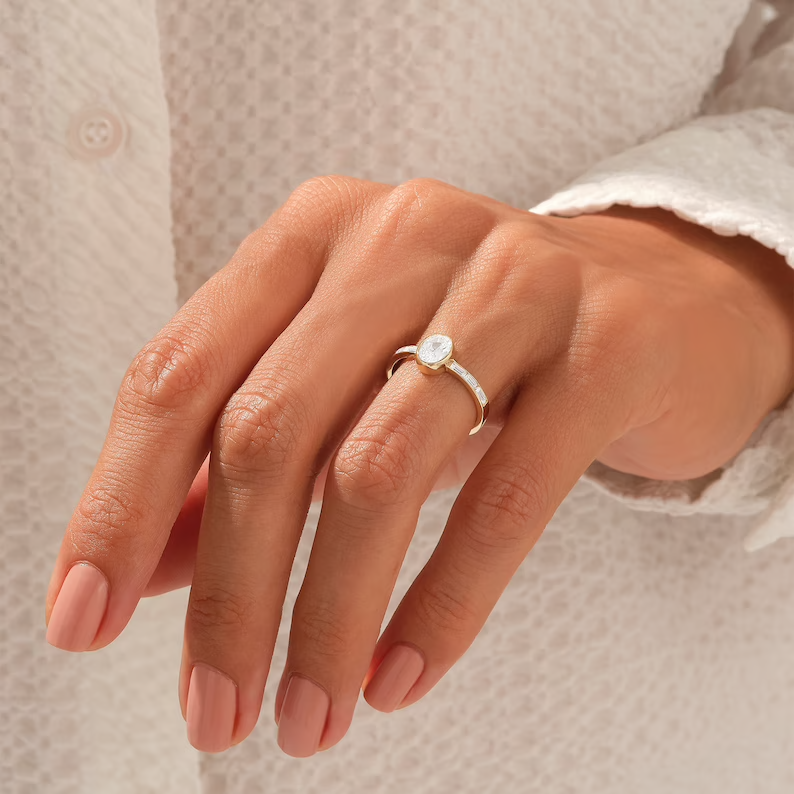14k Gold Bezel Solitaire Diamond Ring Oval Engagement Ring with Baguette Diamond