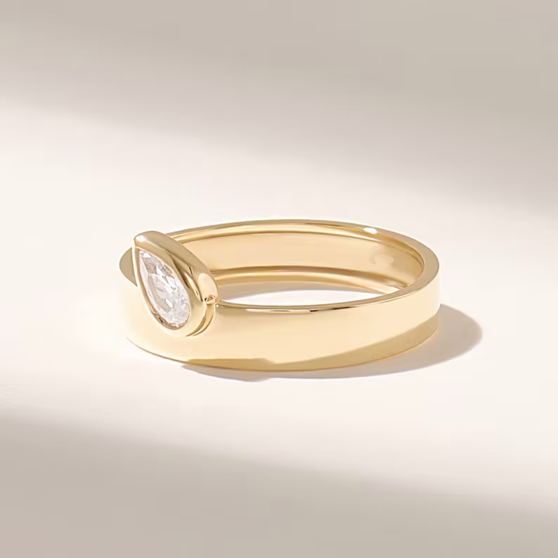 Thumbnail: Solid Gold Pear Diamond Wedding Band