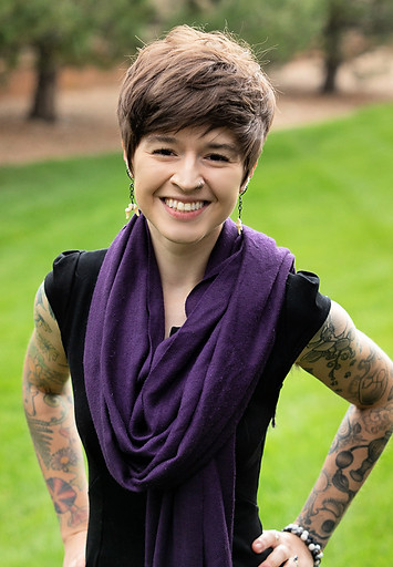 Corinne Headshot Purple Scarf Edited 063025.jpg