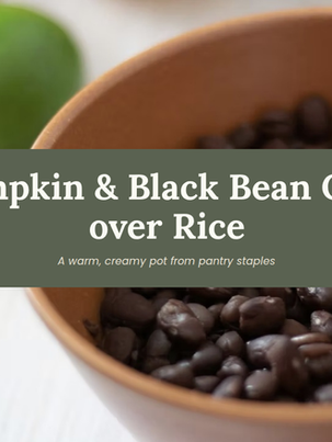 Bowl of thick pumpkin and black bean chili over white rice, topped with corn and cilantro.