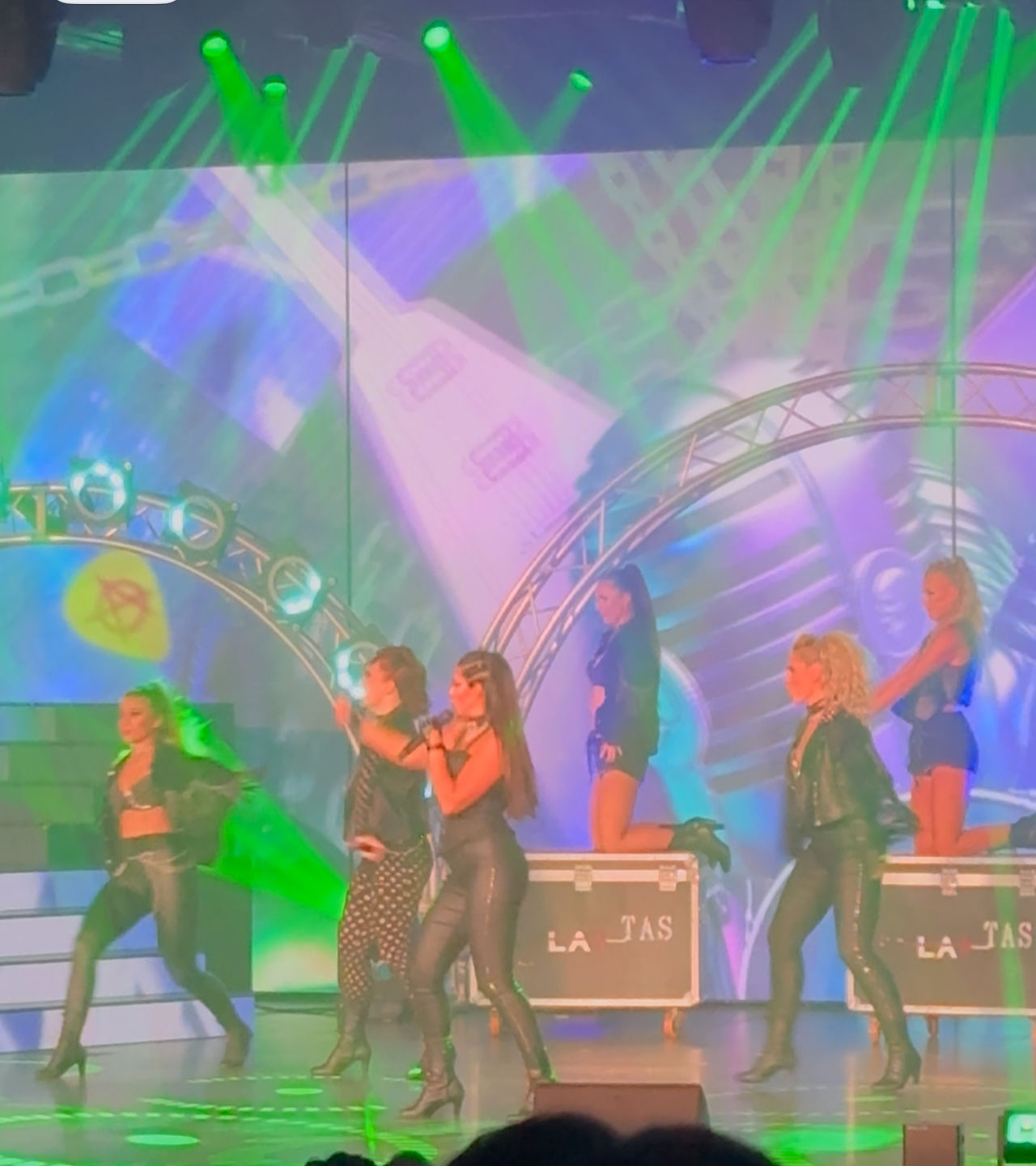 Rock star show on stage with lights and costumes