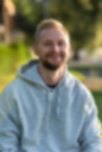 smiley-man-relaxing-outdoors (1).jpg