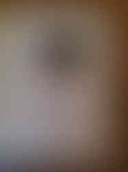 Original sketch of Space Pal in which the toy is pink and has a blank screen for a face on which emotions are displayed.