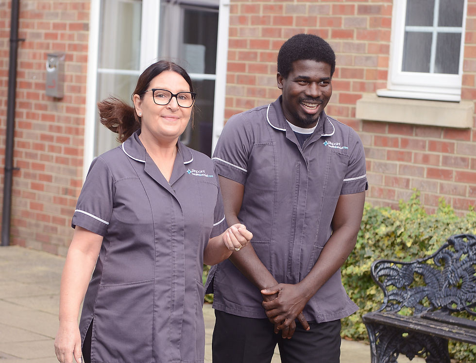 Two care workers talking