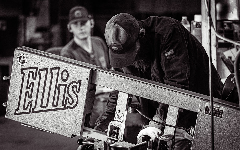 A large Ellis band saw operated by Cole, Head Engineer at Baker Forge
