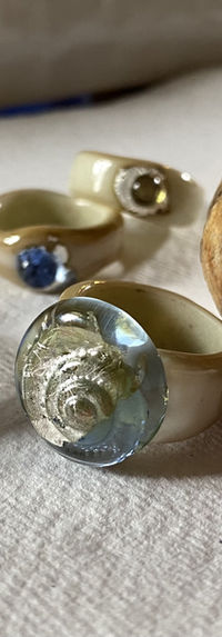 Seascape rings in lampwork glass with silver leaf