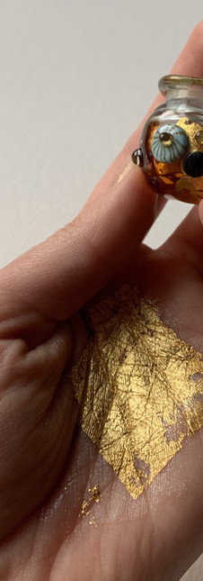Amber and gold leaf lampwork glass vessel