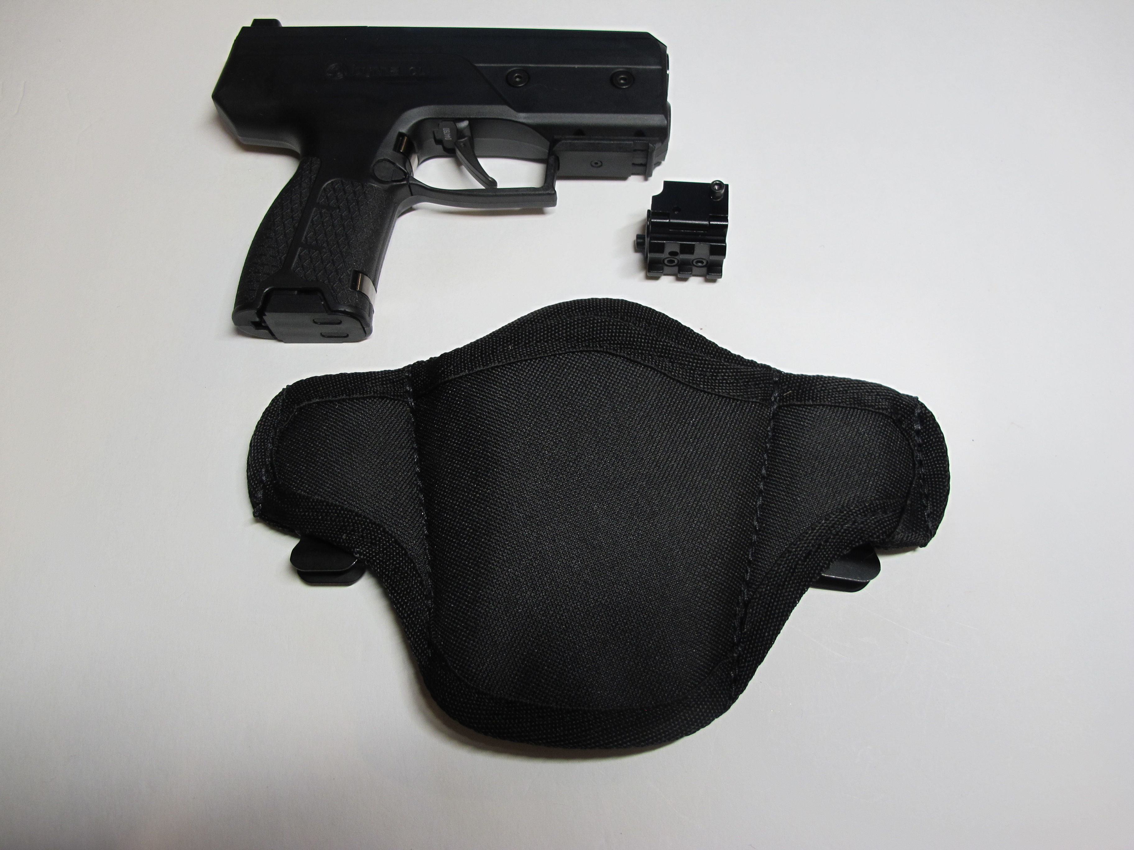 BYRNA CL HOLSTER WITH GREEN DOT LASER TOGETHER