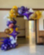 LSU themed balloon garland around the entry way for LSU event.