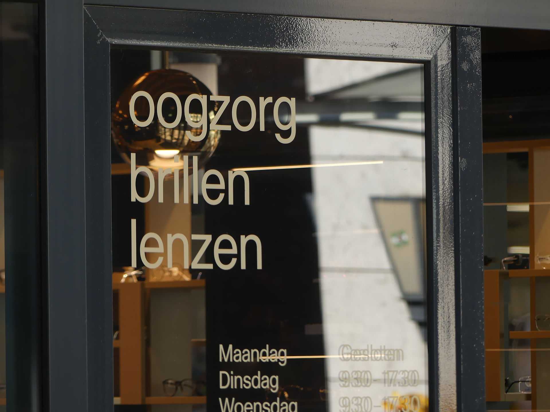 Belettering openingstijden