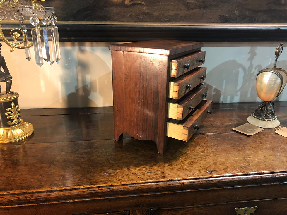 Thumbnail: Miniature chest of drawers in rosewood