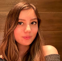 akina t.b. head shot, zoomed in from shoulders to head, nice smile, good lighting