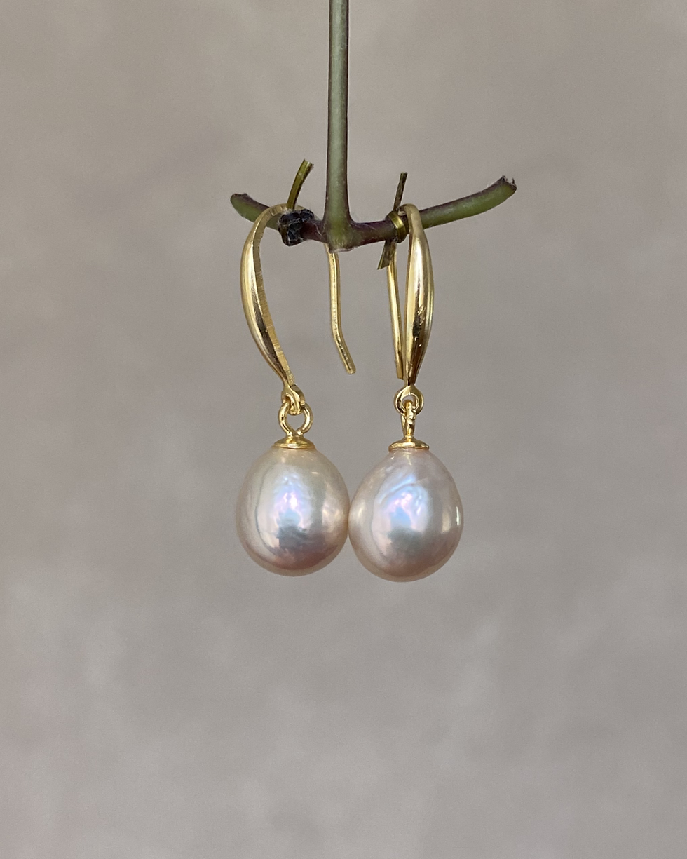 Thumbnail: Sterling Silver Light Golden Lustrous Freshwater Baroque Pearl Dangle Earrings