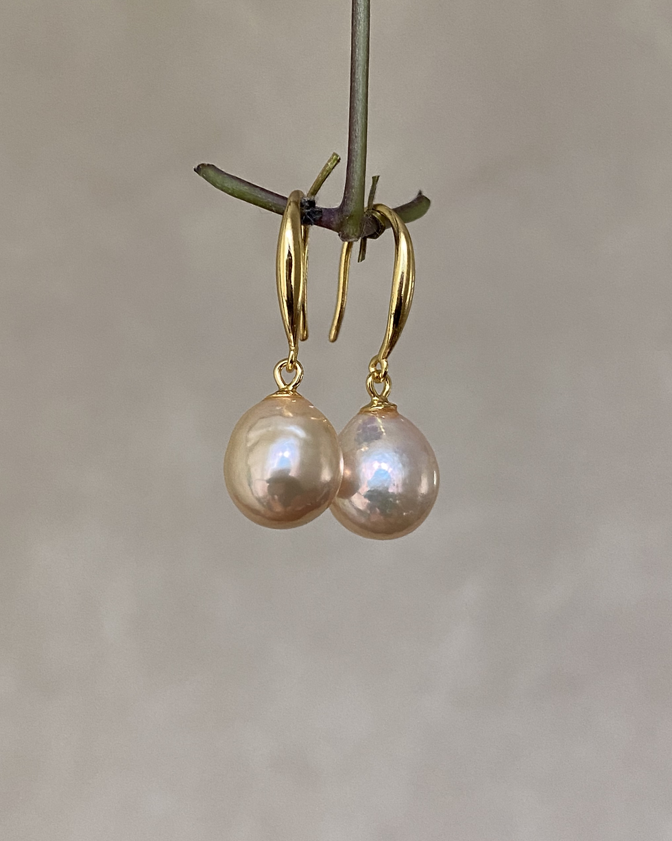 Thumbnail: Sterling Silver Light Golden Lustrous Freshwater Baroque Pearl Dangle Earrings