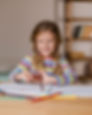 portrait-girl-painting-with-colouring-pencils.jpg