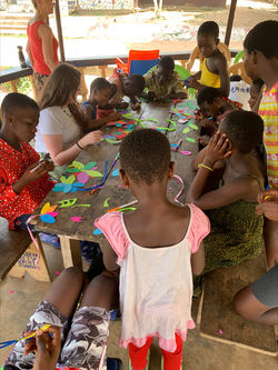 Children working on flowers for Mother's Day