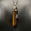 Thumbnail: WRAPPED CRYSTAL POINT NECKLACE