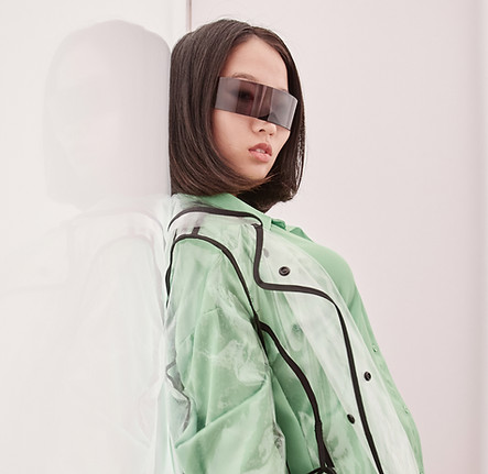 young-asian-woman-wearing-plastic-coat-in-set-2025-03-05-21-19-02-utc.jpg