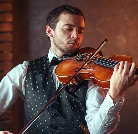 male-violinist-playing-classical-music-on-violin-2024-11-27-21-29-47-utc.jpg