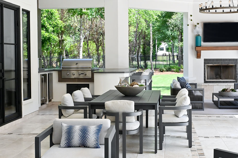 colorful pillows and garden stools for outdoor living spaces. by design interiors, best interior designer in houston, austin, tx, san antonio, tx, interior design in texas