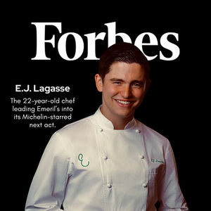 EJ Lagasse on Forbes magazine cover, wearing a white uniform.