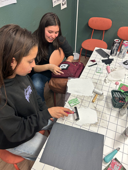 Dia and Tahlia making patches