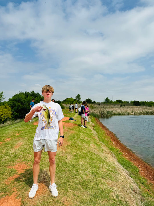 Managed pond shoreline providing safe recreational fishing access