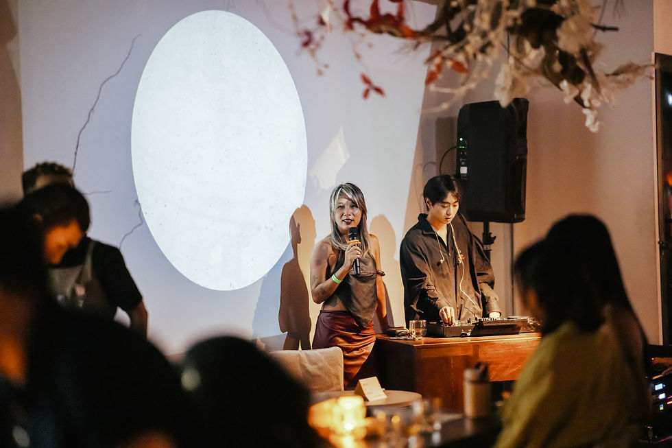 Guests gathered for a conversation in the gallery space during Have A Single Shot at oMM Mixology