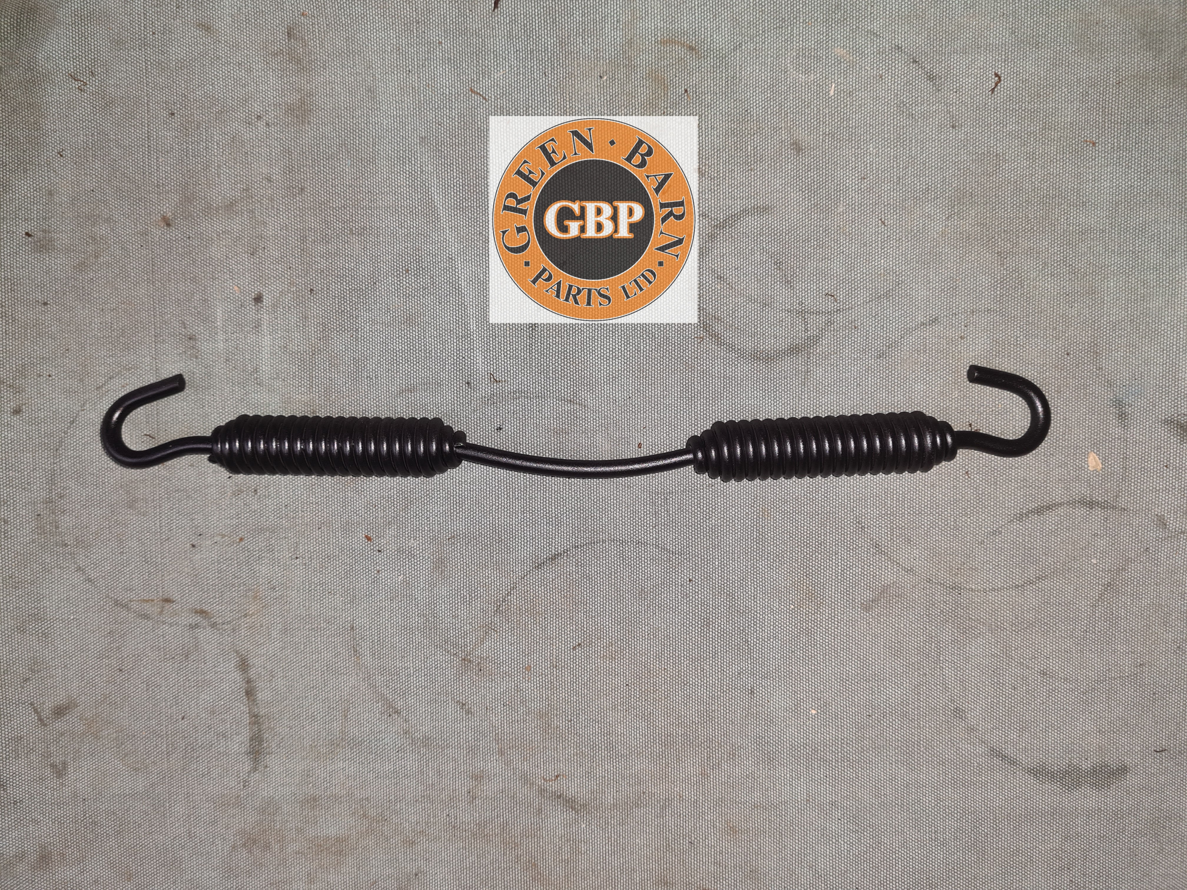 Diamond T 980/981 rear brake shoe spring (NOS)