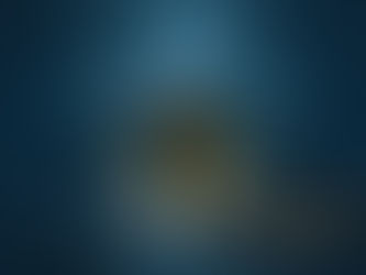 An angel stands before a snowy cave