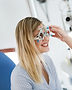 Patient wearing trial frame for eye exam