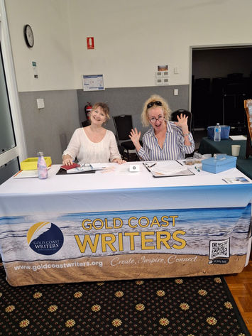 Two women at Gold Coast Writers table
