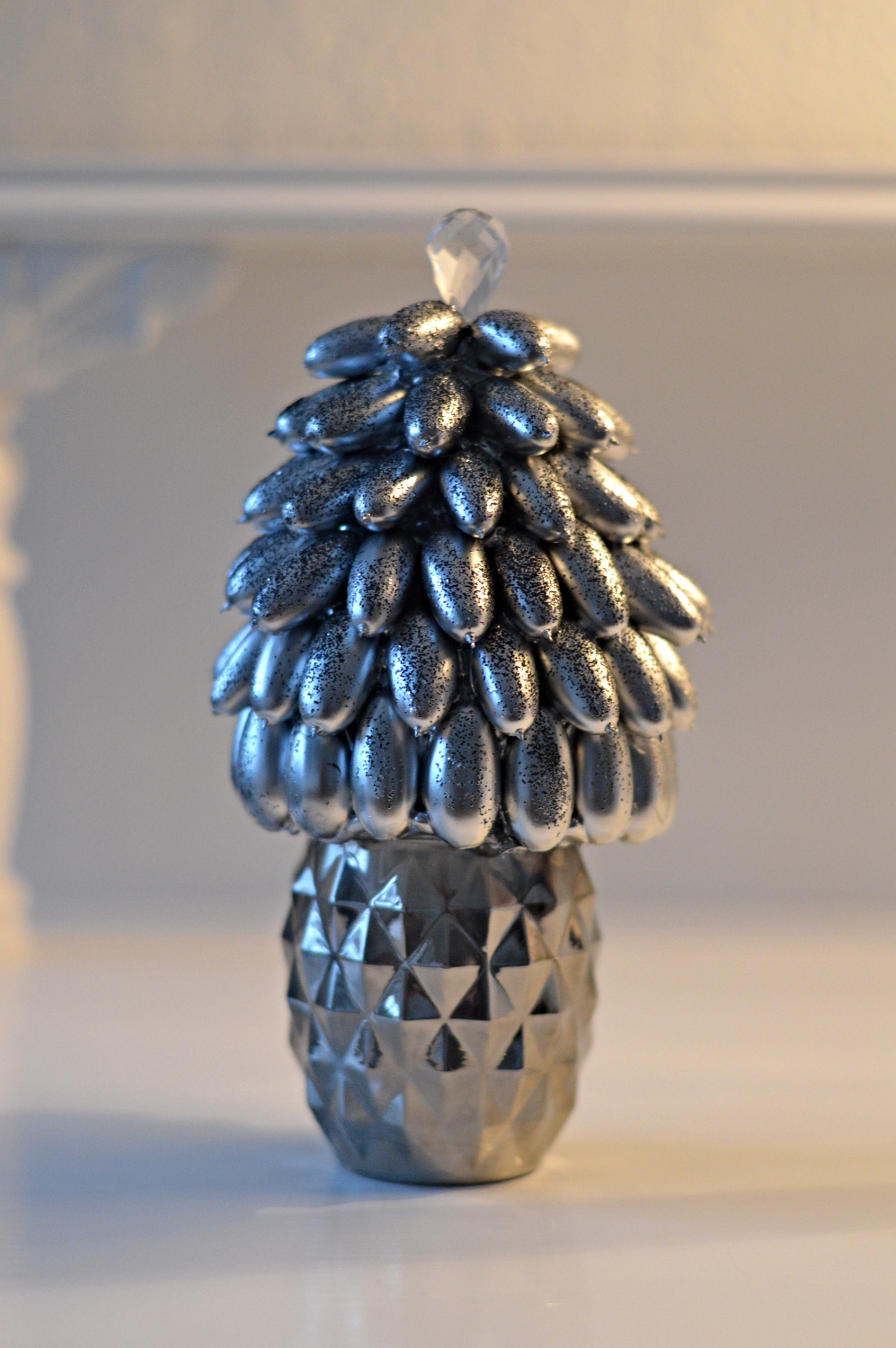 Nøddetræ i sølv med "diamant"