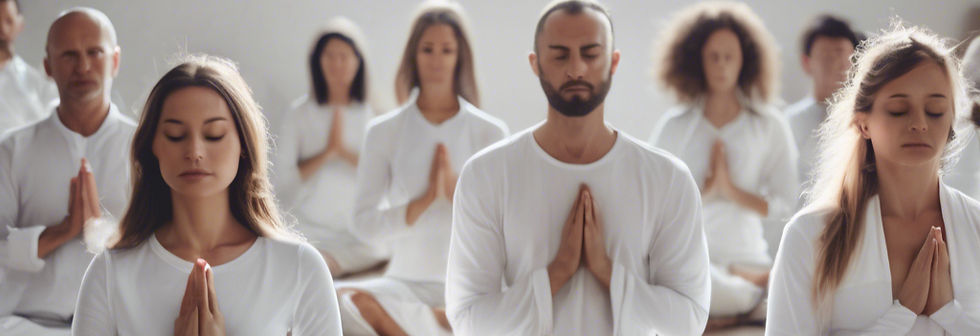 people meditating in white clothes.jpg
