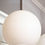 Thumbnail: Small Vintage Milk Glass Globe Pendant with Antique Brass Canopy