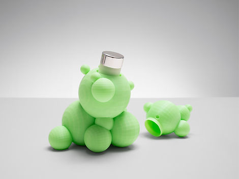 Spheres Parfum von dean.one – grüner skulpturaler Parfumflakon aus unterschiedlich großen Kugelformen