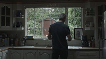 Micheal in kitchen, Growing Charlotte film