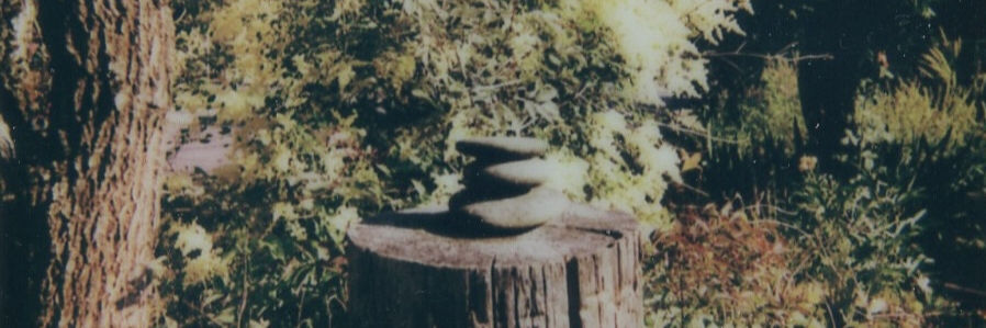 polaroid of a cairn of stones