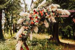 Summer Bohemian Flower Arch from Power of Love Rentals at Springwater Lakes Estate 
