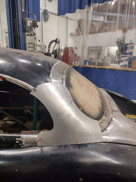 Fitment check on the custom side window frame for 1959 Jaguar XK150 by FFR Fabrication