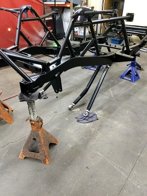Assembled suspension links on the bare frame of the Custom built FJ Cruiser By FFR Fabrication & Repair