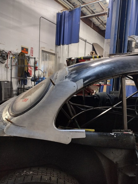 Fitment test on the custom side window frame for 1959 Jaguar XK150 by FFR Fabrication