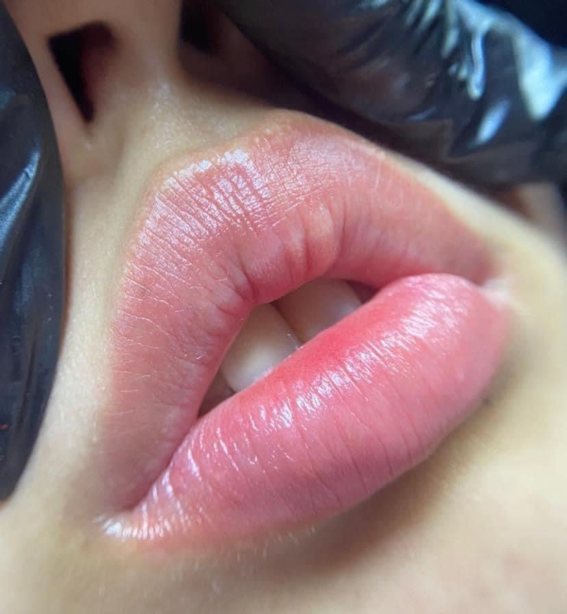 Close-up view of soft lips with natural color