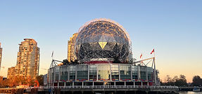 Guests enjoying a gourmet meal on the deck of a Vancouver private yacht charter