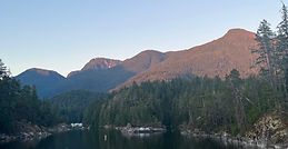 Private yacht cruising near the Vancouver skyline during a luxury charter with Turn Charter